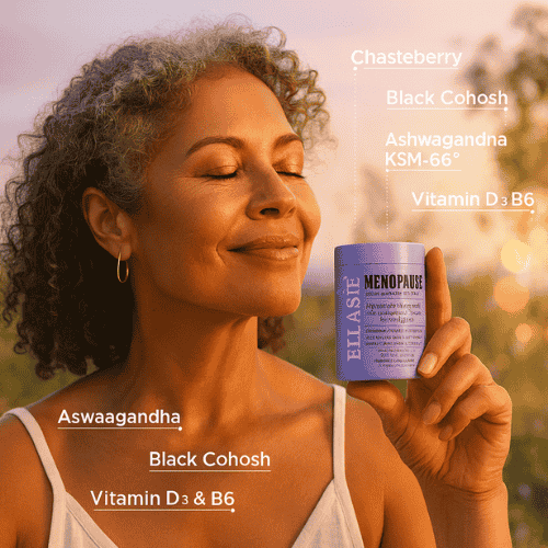 Happy woman holding an Ellasie Menopause supplement bottle