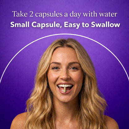 woman with a small capsule between her teeth from ellasie v-juicy vaginal moisture